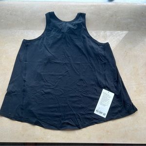 Lululemon new with tags All Tied Up Tank, black size 6.